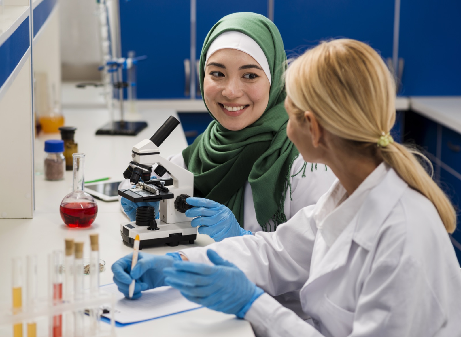 Researchers reviewing scientific publications
